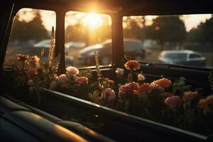 hermosa flores en un coche a puesta de sol. concepto de funeral. ai generado foto