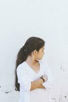 Little girl in bad mood. Resentment, upset, sad, offended kid photo