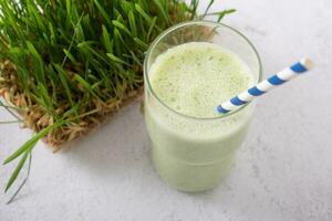 Smoothie with microgreeen and sprouted microgreen oat sprouts. Healthy food concept photo