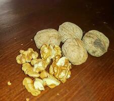 Walnuts scene in their shells and without them photo