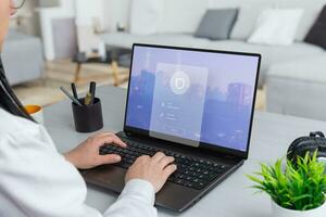 Woman working on a laptop, featuring a security login form hovering above. Merge productivity with the assurance of digital security photo