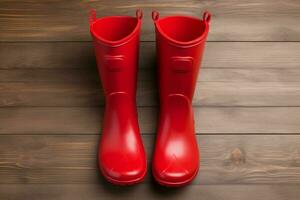 Pair red rubber boots on wooden board. Generate Ai photo