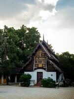 Ancient old wooden building in the clear blue sky day photo