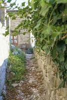 Picture from the town of Groznjan with idyllic cobbled streets and buildings made of natural stone photo