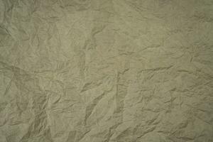 Brown crumpled paper. Abstract background. Banner. Top view. Copy space. Selective focus. photo