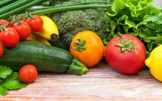 Fresh vegetables and fruits on a wooden table. Healthy food, harvesting, farming, Thanksgiving Day. Copy space. photo