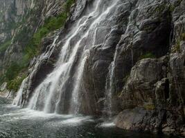 ship cruise in the norwegian fjords photo