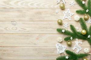 Christmas background with fir branches and Christmas decor. Top view, copy space for text photo