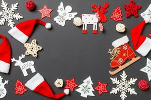 New Year decorations on black background. Merry Christmas concept with empty space for your design photo