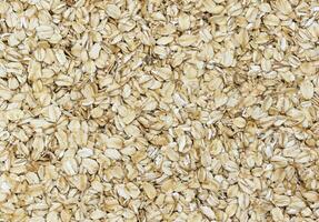 Oat flakes grain texture photo