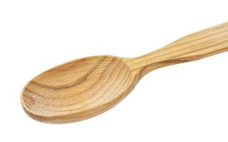 Empty wooden spoon isolated on white background photo