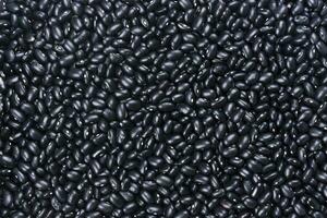 Black kidney beans background. Bean pattern photo