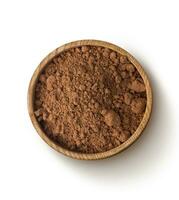 Cocoa powder isolated on white background. Top view photo