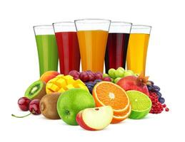 Glasses of different juice and pile of fruits and berries isolated on white background photo
