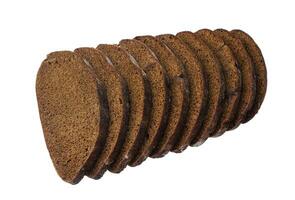 Sliced black rye bread isolated on white background photo