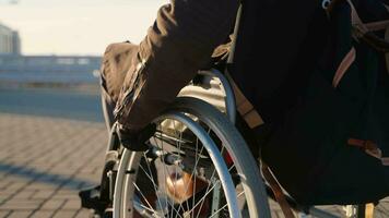 Handicapped man in wheelchair is ready to move video