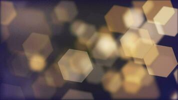 Abstract bokeh background animation with gently flickering defocused warm golden bokeh light hexagons. This elegant motion background is full HD and a seamless loop. video