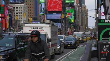NEW YORK CITY, USA - NOVEMBER 21, 2018 Cars Traffic, Cyclists and People at Times Square at Day. Medium Shot video