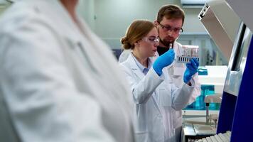 Medical Science Laboratory with Diverse Multi-Ethnic Team of Scientists Developing Drugs, Medicine, Doing Biotechnology Research. video