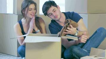 Loving couple enjoys a new apartment video