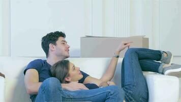 Man and woman hugging together in an empty apartment video