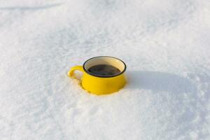 Coffee in a cup on the background of a winter theme photo