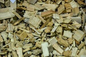 a pile of wood chips in a box photo