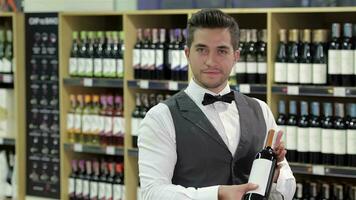 Presenting a wine bottle, with elegance video