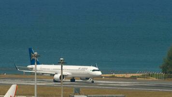 ALMATY, KAZAKHSTAN MAY 4, 2019 Passenger jet Airbus A321, EI KGH of Air Astana take off at Almaty airport. Passenger flight departure. The plane accelerates and flies away video