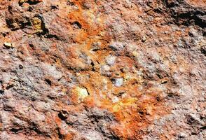 a close up of a metal wall with some rust on it photo