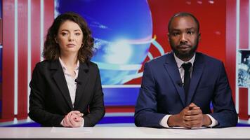 Diverse journalists hosting morning show to address all news topics live on global network, international tv program. Media reporters team presenting entertainment events on broadcast panel. photo