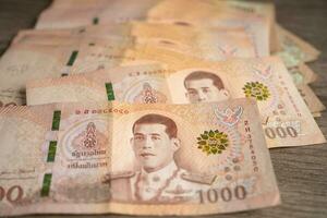 Thai baht banknotes, business saving finance investment concept. photo