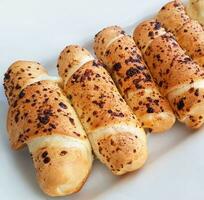 Delicious baked cheese rolls, baked crunchy cheese bread on an catering event, selected focus, cheese wrapped in bread and baked photo