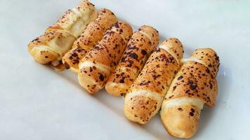 Delicious baked cheese rolls, baked crunchy cheese bread on an catering event, selected focus, cheese wrapped in bread and baked photo