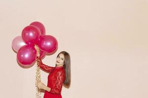 beautiful and happy girl holds air balloons. valentines day, birthday, womens day, anniversary, holiday celebration concept photo