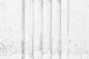 White Grunge Concrete Wall in Vertical Stripe Texture for Background. photo