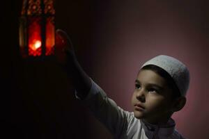 Praying muslim boy photo