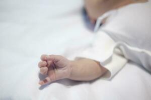 Newborn baby hand, close up photo