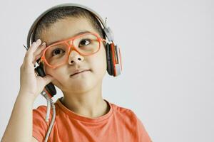 Portrait of thoughtful schoolboy having a big idea photo