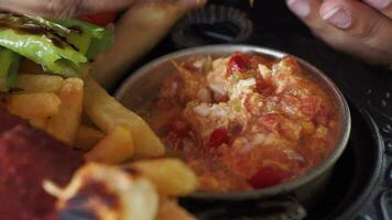 Turkish Menemen omelet in a frying pan. . video