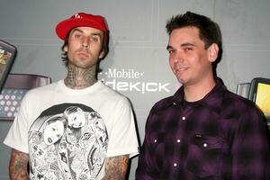 Travis Barker  DJ AM  arriving at the  TMobile Sidekick LX Launch Event at  Paramount Studios inin Los Angeles CA on May 14 2009 photo