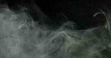 Organic cloud of dust particles floating on black screen overlay. Filmed with RED camera in slow motion. video