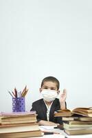 Back to school after covid-19 pandemic. Schoolboy during a school activity photo