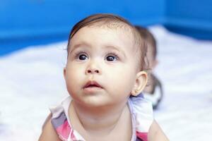 Close-up view of cute middle-eastern baby girl photo