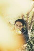 Apple woman. Portrait of beautiful middle-eastern woman at apple garden. Young female posing at the nature with freshly picked autumn apple fruits. Apple woman photo