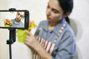 Multiracial florist blogger live streaming online photo