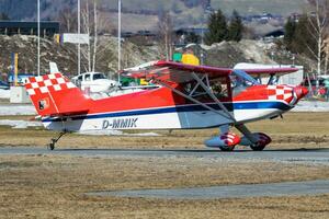 Commercial plane at airport and airfield. Small and sport aircraft. General aviation industry. Vip transport. Civil utility transportation. Fly and flying. photo