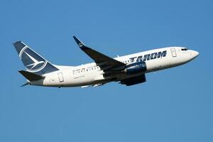 TAROM Boeing 737-700 YR-BGH passenger plane departure and take off at Vienna Airport photo