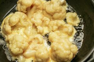 Vegetables Cauliflower fried in a batter of egg and flour photo