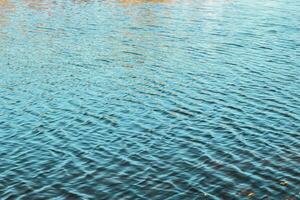 river surface texture, waves shining in the sun. photo